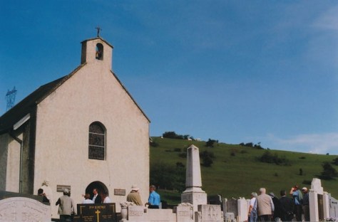 View across cemetery to Monteynard church.